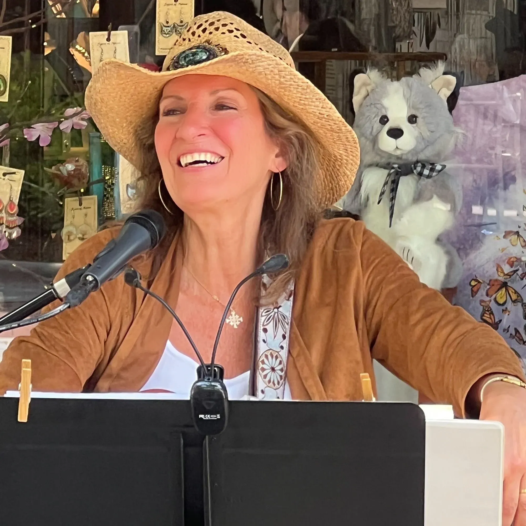 Andrea Randa performing live in a cowboy hat